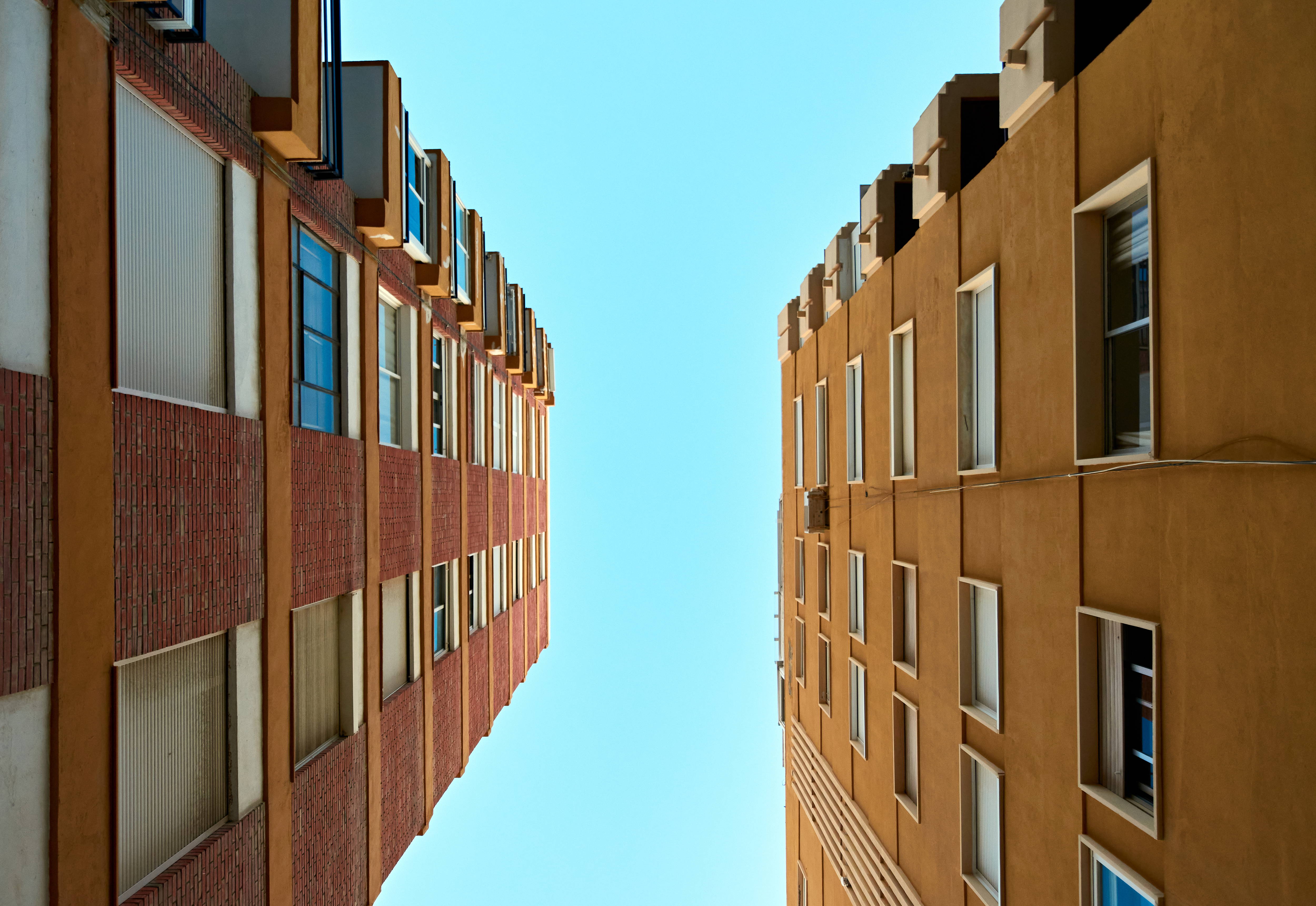 2 large red brick blocks of flats